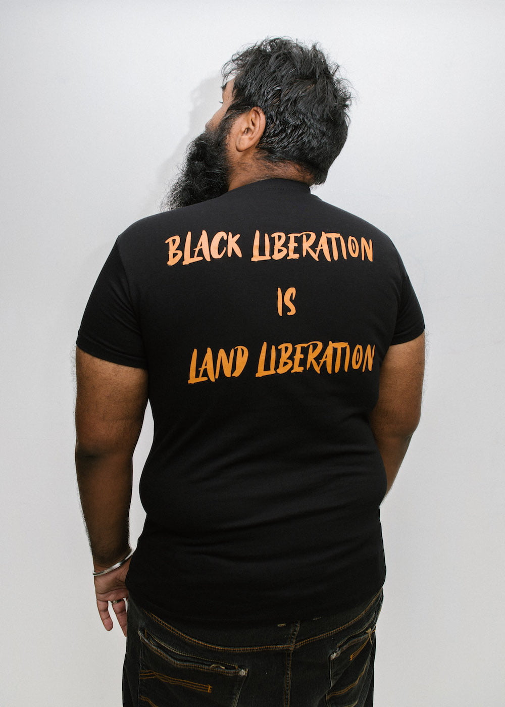 Land In Our Names shirt photography by Ellie Ramsden for Freedom Press